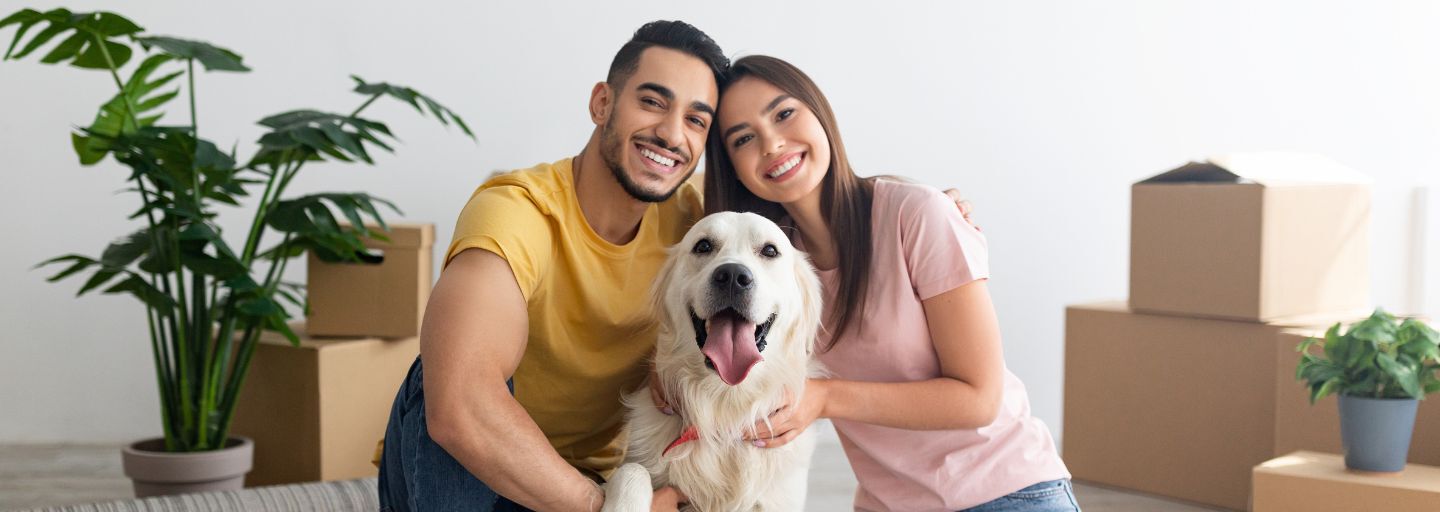 couple with a golden retriever 